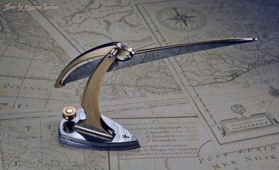 Trebuchet #2 - Damasteel blade and base with bronze stand details.