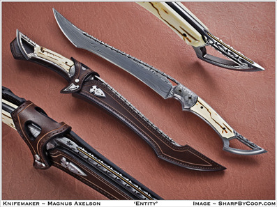 Entity - Damasteel with bronze inlayed filework Meteorite bolsters and Mammoth scales. Sheat with Damasteel details.