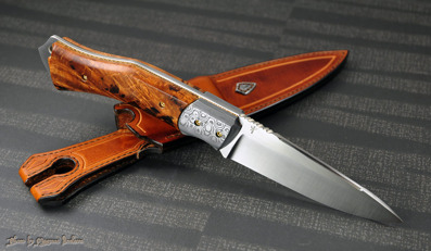 "Buscrafter"- Sandvik 12c27 blade with Damasteel bolsters, Boxelder burl scales and fileworked Bronze liners.