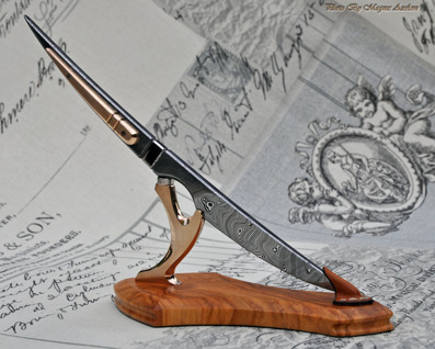 Coop's Desk Scalpel - Damasteel blade with bronze details and Olivewood base.