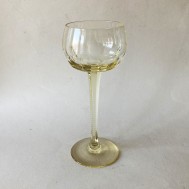 Eight yellow white wineglasses