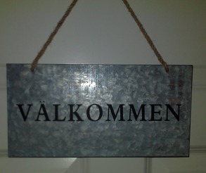 Välkommenskylt