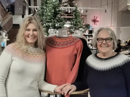Pernille in the Stars and Solveig in the Blue Miston each side of Bohus Stickning Mandelträdet. Photo Ingalill Hammar.