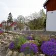 Utsikt mot Gårdshuset och  Stallet på Stakaberg Gårdshotell och B&B i Holm nära Halmstad och Tylösand