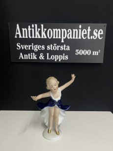 65681. Porslin figurin