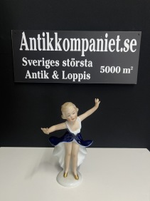 65681. Porslin figurin