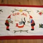 En fin handbroderad julbonad i bomull
