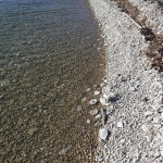 Fina stenar på stranden.