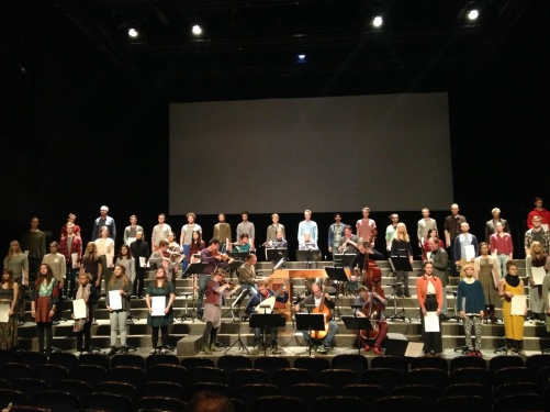 Full ensemble on stage during rehearsal!