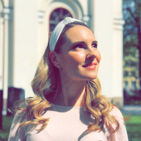 Hannah Holgersson in the sunshine, at Adolf Fredrik Church, Stockholm