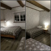 Room 6, Harebo. The room has a double bed and a sofa bed, a shelf, a small table, a sink and clothes hangers. Suitable for a family of 2 adults and 1 or 2 children.