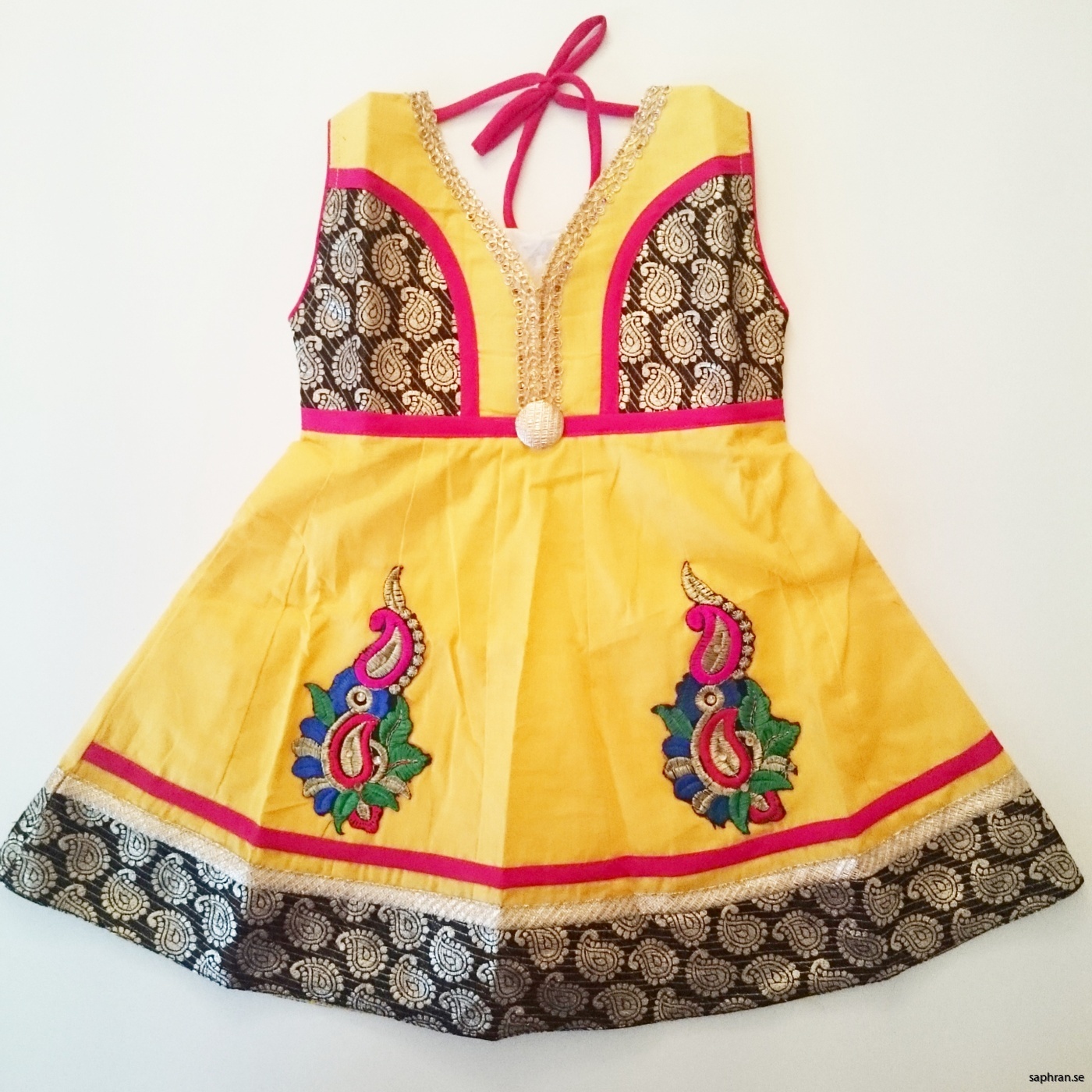 Indisk färgglad barnklänning