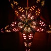 Färgglad Glittrig julstjärna/adventsstjärna - Svart