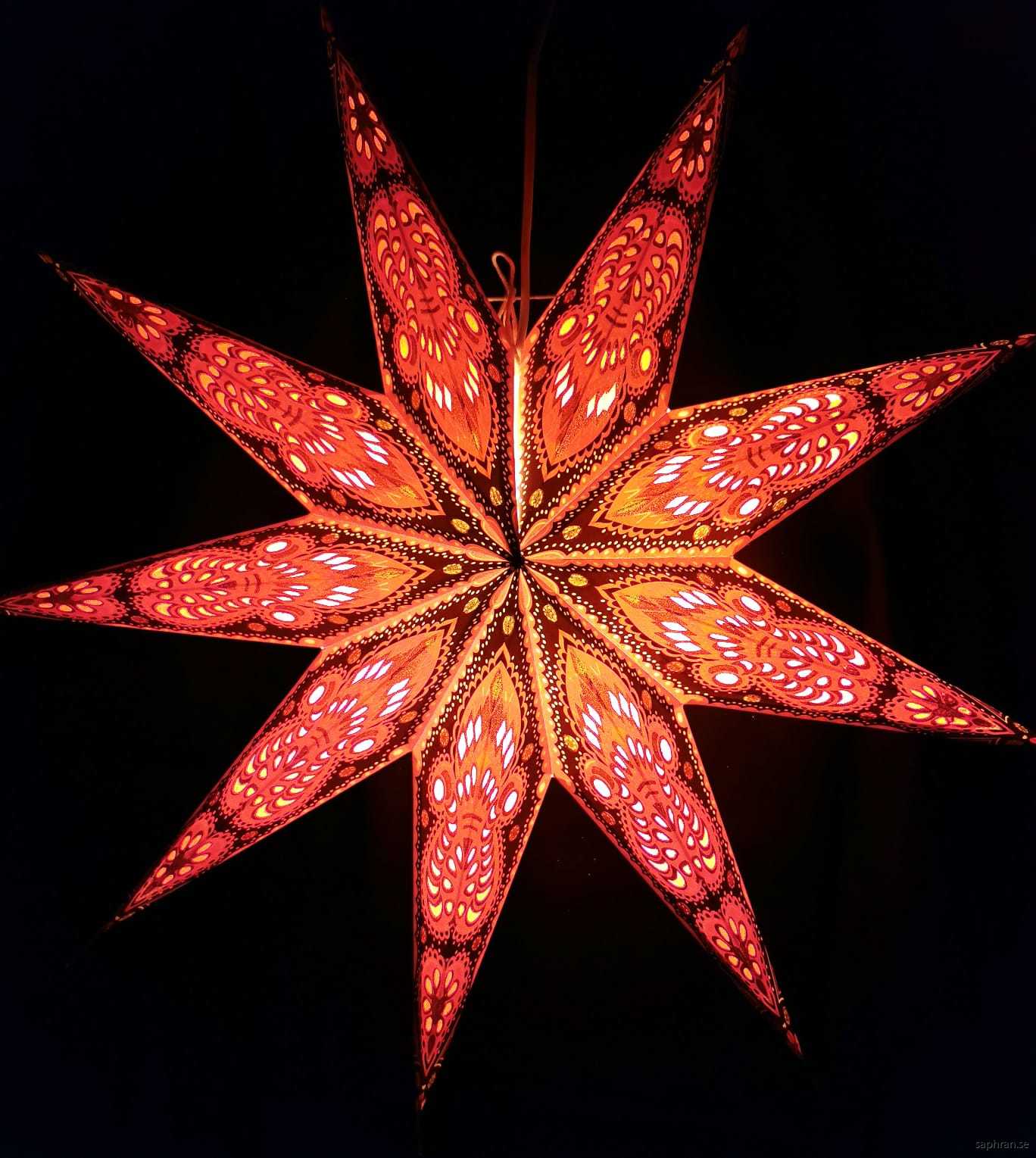 Orientalisk Julstjärna/adventsstjärna i rött och svart papper med 9 armar