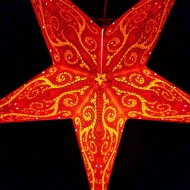 Röd adventsstjärna i kitschig Indisk/Orientalisk stil