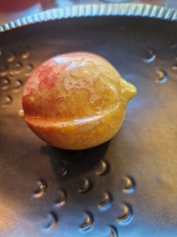 Alabaster frukt persika