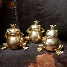 Tre guldiga grodor