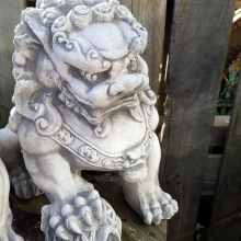 Kinesiskt lejon i betong
