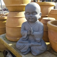 Gullig ung Buddha