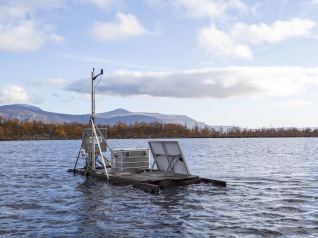 The raft in lake Ambergasjön is deployed during the ice-free period of the year to continuously collect measurements for SITES (Photo: Melina Granberg).