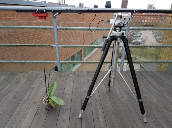 Fig 2. The camera calibration starts on the roof of the department. Close pictures of reflective targets and other features, as vegetation, are taken. Right after the picture, the reflectance is measured with the spectrometer. Photo by Ximena Tagle. Fig 2. The camera calibration starts on the roof of the department. Close pictures of reflective targets and other features, as vegetation, are taken. Right after the picture, the reflectance is measured with the spectrometer. Photo by Ximena Tagle.