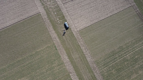 UAV flying over fields and reflectance panels on March 13th 2017. Image taken from the Sony camera on-board of the UAV.