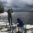 Marcus and Carlota sampling the mesocosms