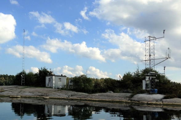 The eddy covariance tower (right) located on Malma Island in Lake Erken.  Photo by Kurt Pettersson