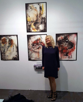 Dana Ingesson with her art Dana Ingesson with her art