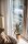 vecteezy_plant-and-couch-beside-window_1248254