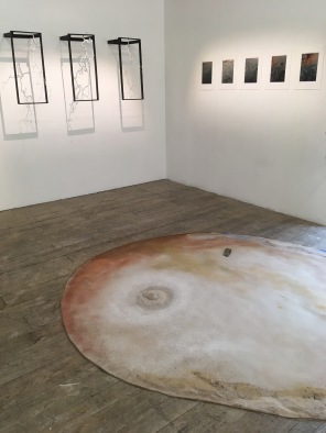 Installation view pigmented sand with object and photo  M Shahsavari.