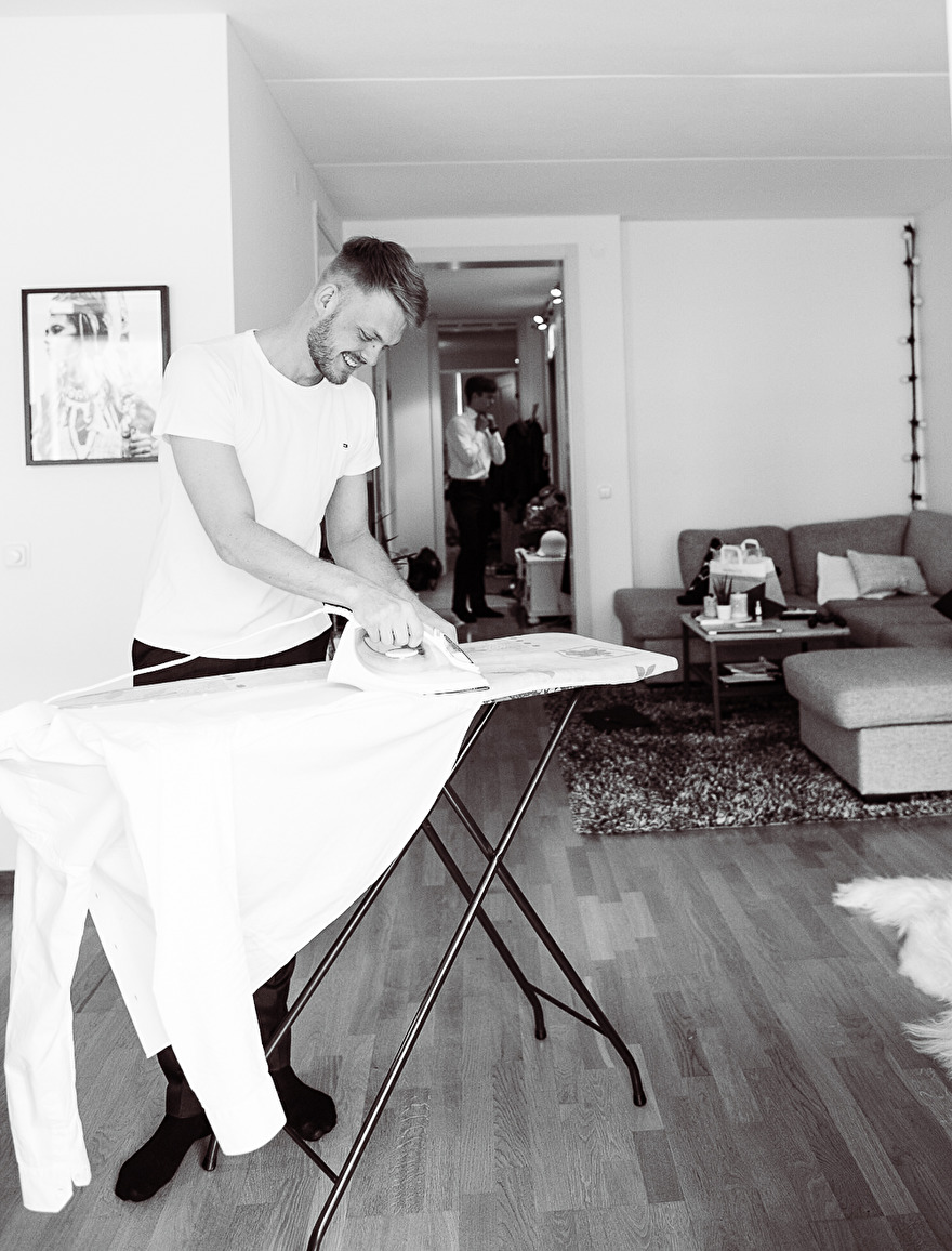 Groom is getting ready for wedding. Photo by Rebecca Wallin Groom is getting ready for wedding. Photo by Rebecca Wallin