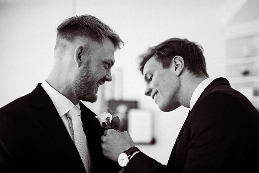 Groom is getting ready for wedding. Photo by Rebecca Wallin Groom is getting ready for wedding. Photo by Rebecca Wallin