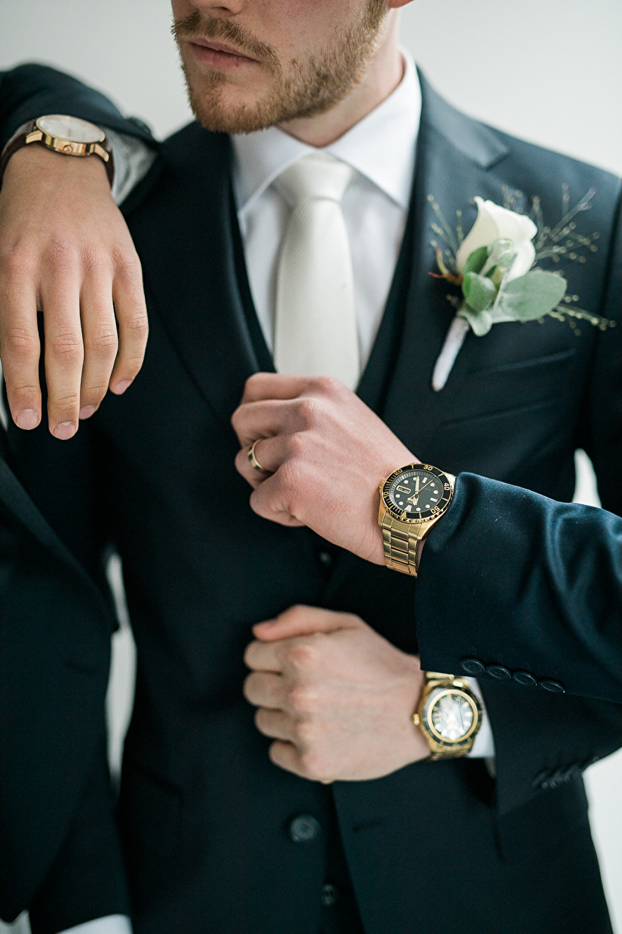 Groom is getting ready for wedding. Photo by Rebecca Wallin Groom is getting ready for wedding. Photo by Rebecca Wallin