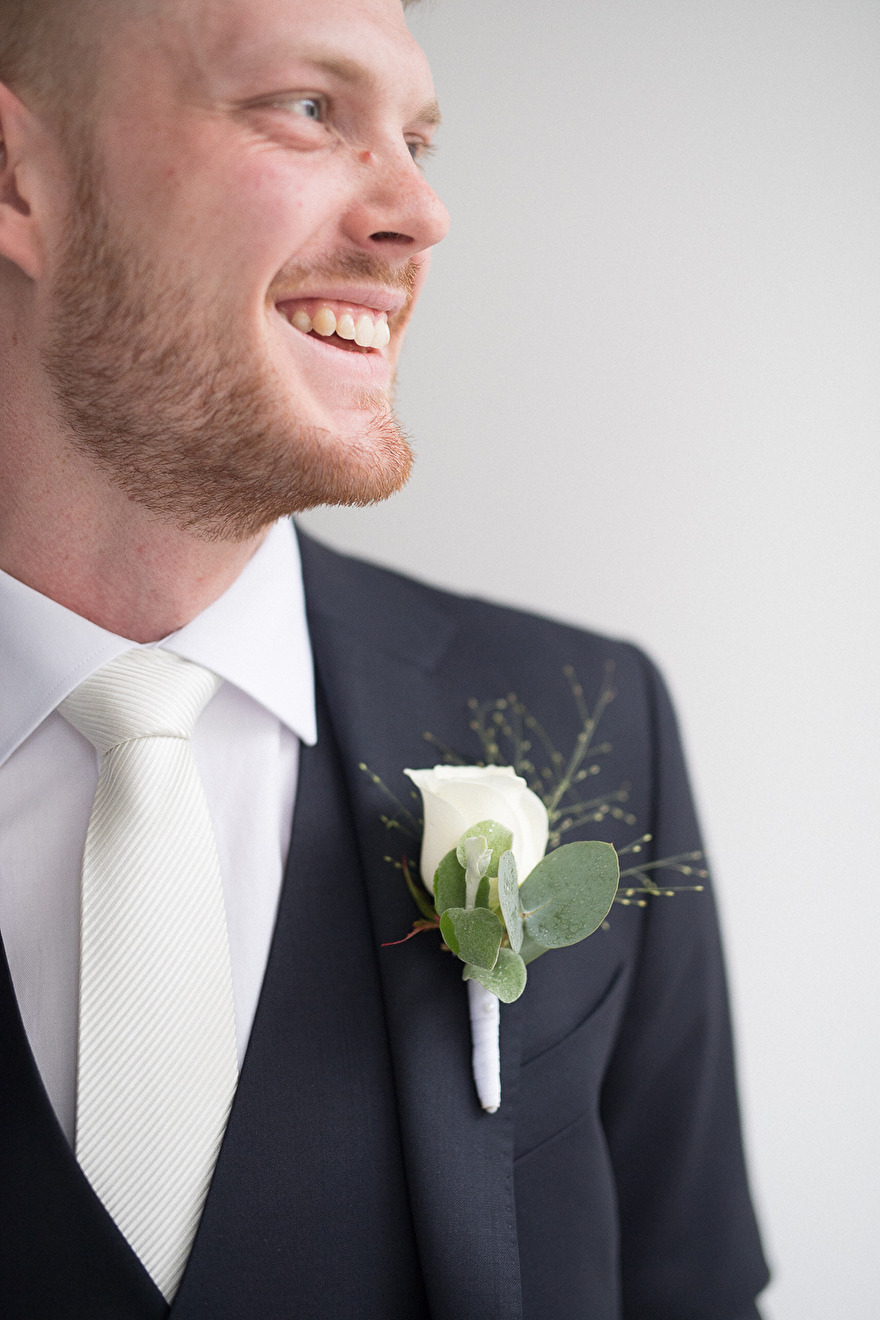 Groom is getting ready for wedding. Photo by Rebecca Wallin Groom is getting ready for wedding. Photo by Rebecca Wallin