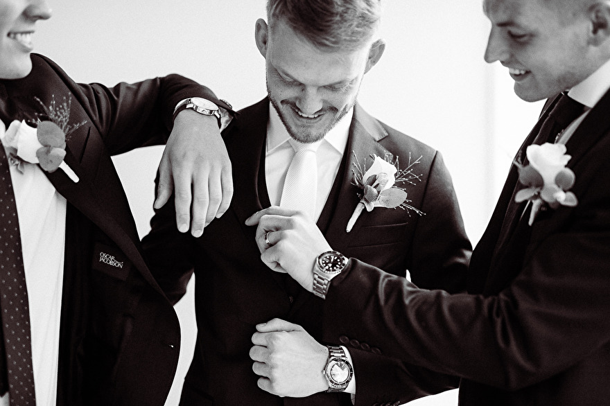 Groom is getting ready for wedding. Photo by Rebecca Wallin Groom is getting ready for wedding. Photo by Rebecca Wallin