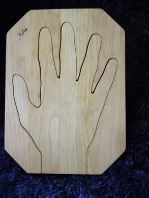 Grytunderlägg med din hand och ditt namn. Personlig present. Ihopfälld till den lilla kastrullen...... Grytunderlägg med din hand och ditt namn. Personlig present. Ihopfälld till den lilla kastrullen......