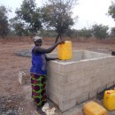 Women helping in providing water