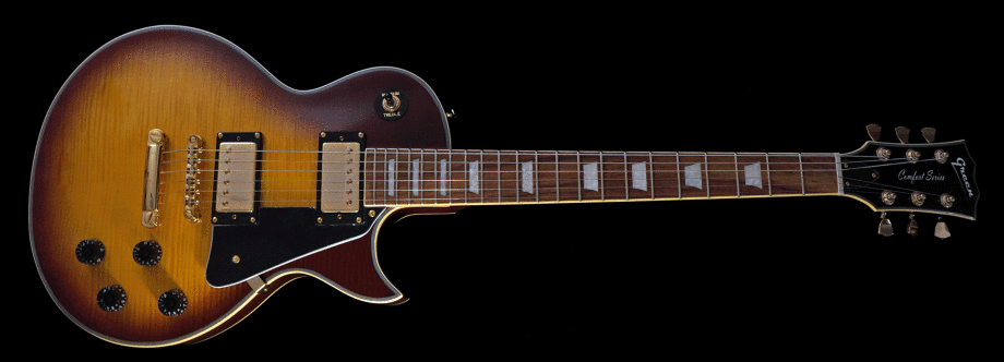 Gold Chrome hardware, black plastic, trapezoid inlays
