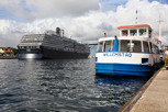 Cruise ship and local transportation boat at Willemstad, Curacao