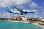 Air Caraïbes Airbus A330-200 on final approach over Maho Beach, Sint Maarten