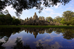 Bayon temple mirrored in a puddle, Angkor Thom