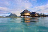Overwater bungalows at Pearl Beach Resort with Mount Otemanu as backdrop, Bora Bora