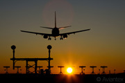 Boeing 737-600 on final approach to runway 26 at Stockholm/Arlanda during sunset..