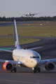 A Boeing 737-600 taxiing to gate after landing while an A330-300 is about to touching down on rwy 19L at Stockholm/Arlanda