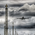 An Airbus A340-300 on final approach to 22L at Copenhagen/Kastrup under threathening skies