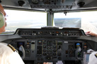 Flight deck of a Fokker 50 on final approach