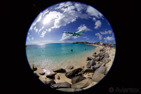 Air France Airbus A340-300 on final over Maho Beach at Sint Maarten in a fish eye perspective