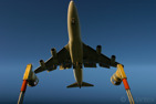 A Boeing 747-400 over the approach lights