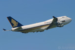 The national carrier, Singapore Airlines with a Boeing 747-400 also known as Megatop